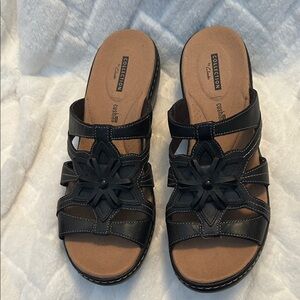 Clarks Black Floral Women's Sandals. Never worn, size 10.